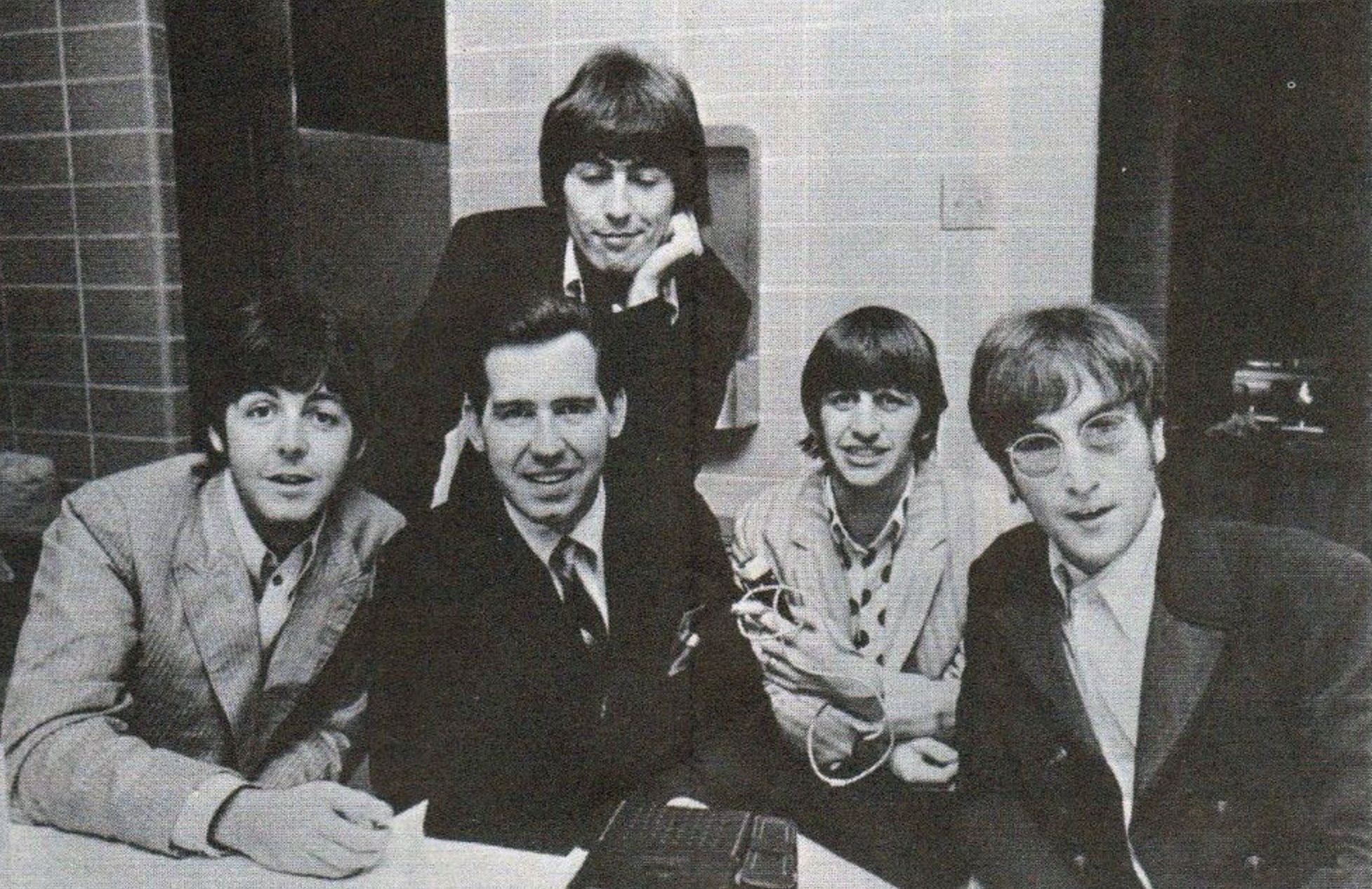 The Beatles during their final US tour with DJ Jim Stagg 